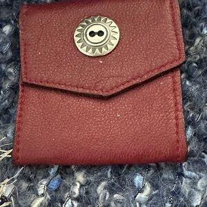 Red and White Leather cord cover for the phone and the other products.